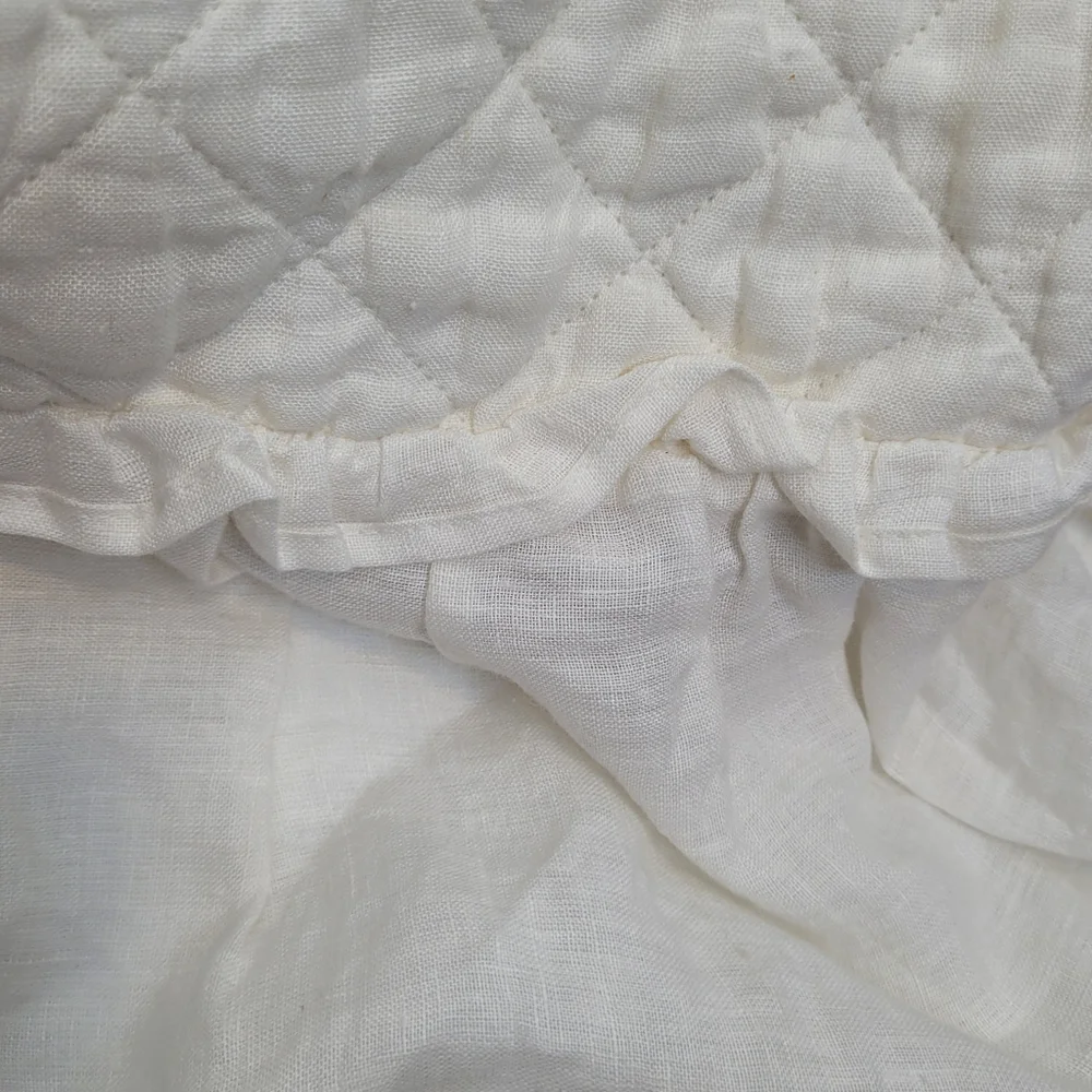 Amity Home Linen Caprice Quilted Ruffled Baby Quilt White